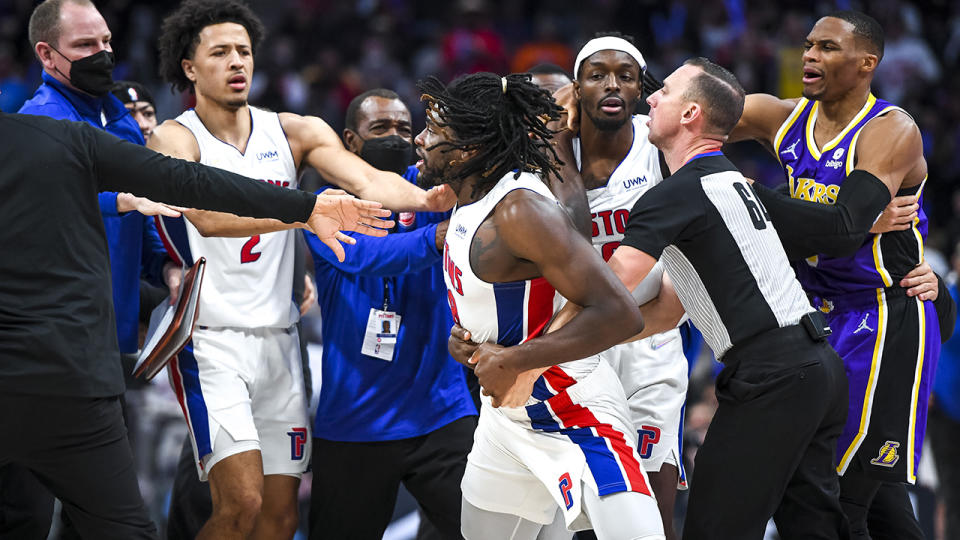 Isaiah Stewart, pictured here having to be restrained as he attempted to get back at LeBron James.