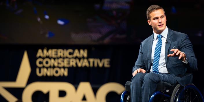 Madison Cawthorn speaks on stage at the CPAC event on July 2020