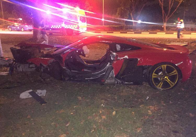 An accident occurred between a McLaren sports car and taxi on 22 October. (Photo: Facebook)
