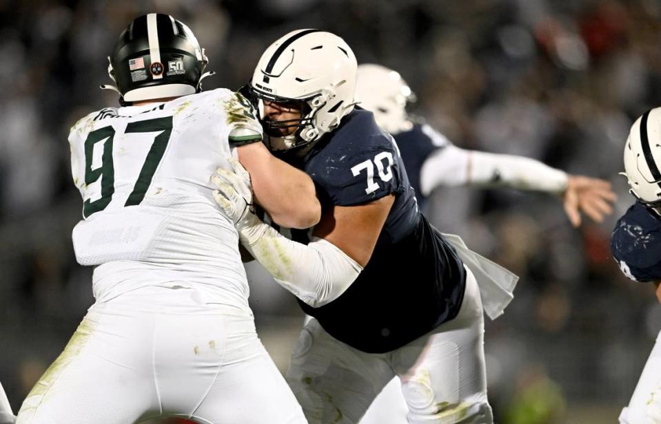 Penn State offensive lineman Juice Scruggs blocks Michigan State’s Maverick Hansen during the game on Saturday, Nov. 26, 2022.