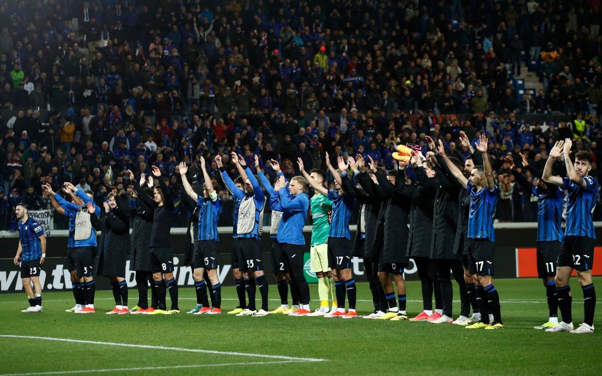 Atalanta celebrates in front of their fans