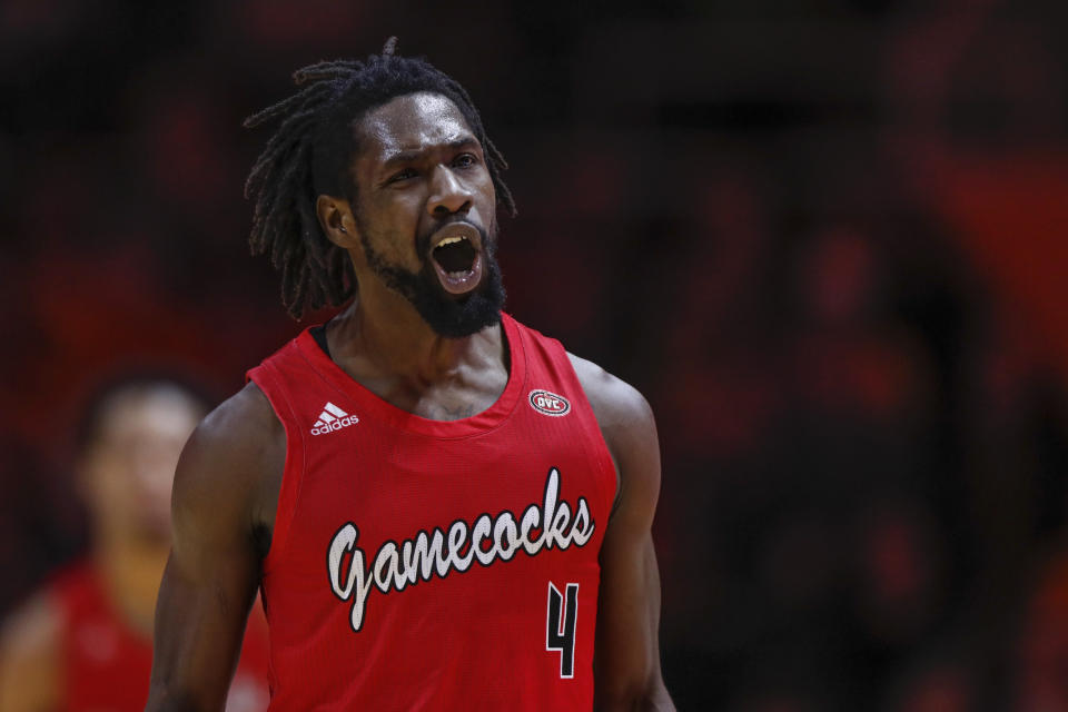 Jacksonville State guard Ty Hudson (4) reacts to hitting a 3-point shot during the first half of an NCAA college basketball game against Tennessee Saturday, Dec. 21, 2019, in Knoxville, Tenn. (AP Photo/Wade Payne)