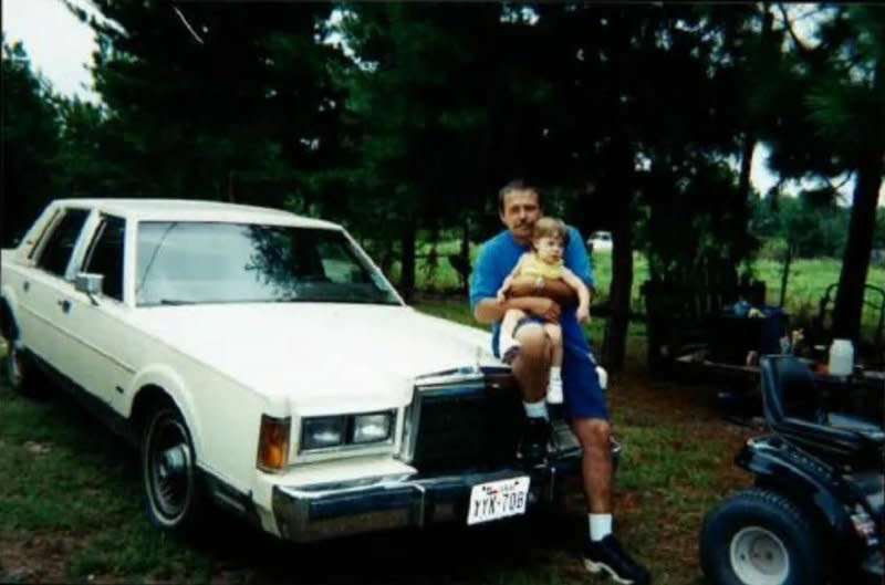 Robert Roberson is seen here in this undated photo holding his daughter, Nikki Curtis. Photo courtesy of Roberson Family