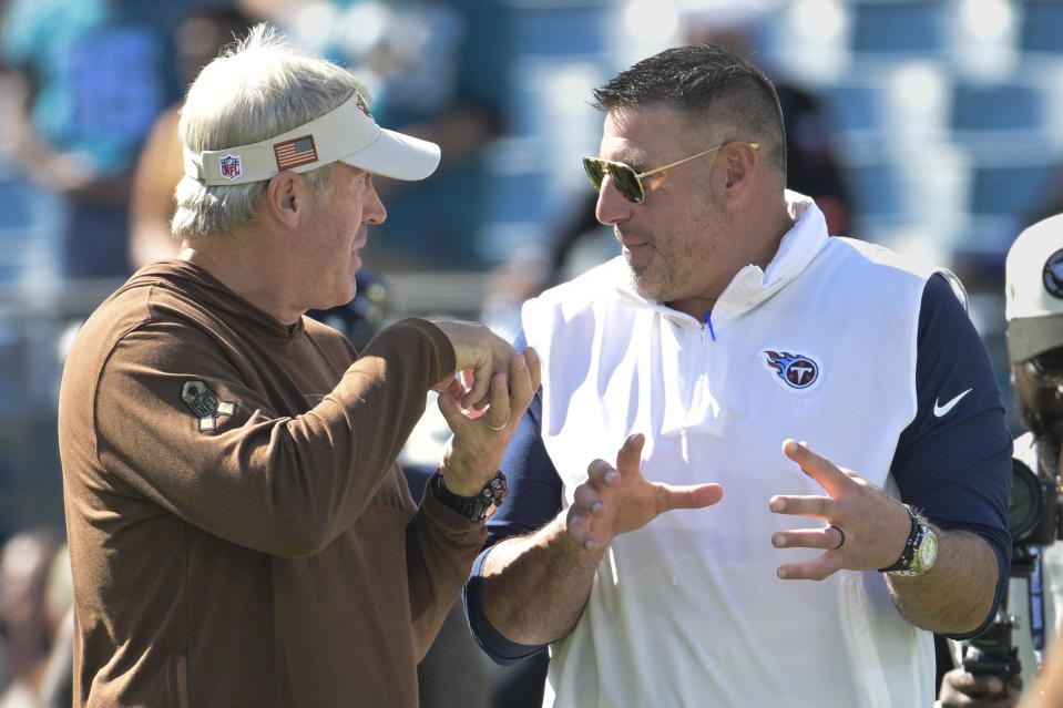 Jacksonville Jaguars head coach Doug Pederson, left, talks with Tennessee Titans head coach Mike Vrabel before an NFL football game Sunday, Nov. 19, 2023, in Jacksonville, Fla. (AP Photo/Phelan M. Ebenhack)