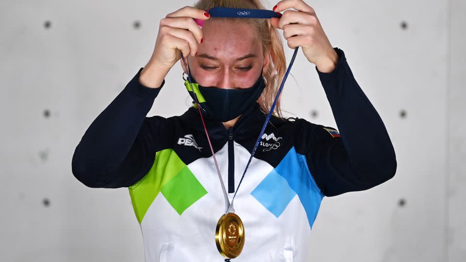 Garnbret celebrates on the podium after winning gold at Tokyo 2020. - Mohd Rasfan/AFP/Getty Images