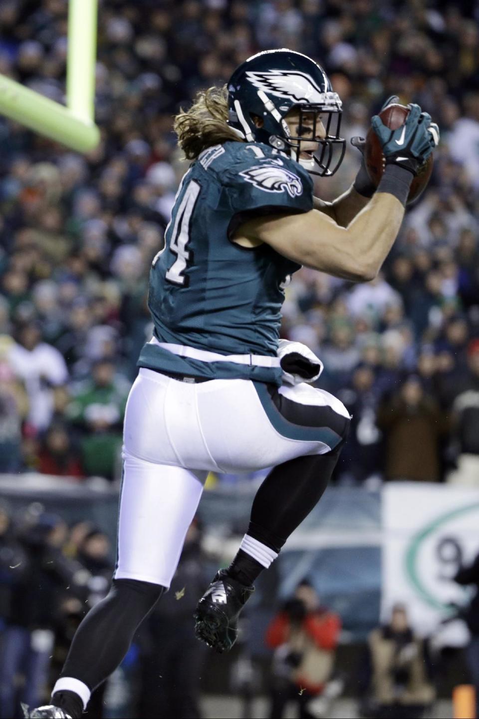 Philadelphia Eagles' Riley Cooper scores a touchdown during the first half of an NFL wild-card playoff football game against the New Orleans Saints, Saturday, Jan. 4, 2014, in Philadelphia. (AP Photo/Matt Rourke)