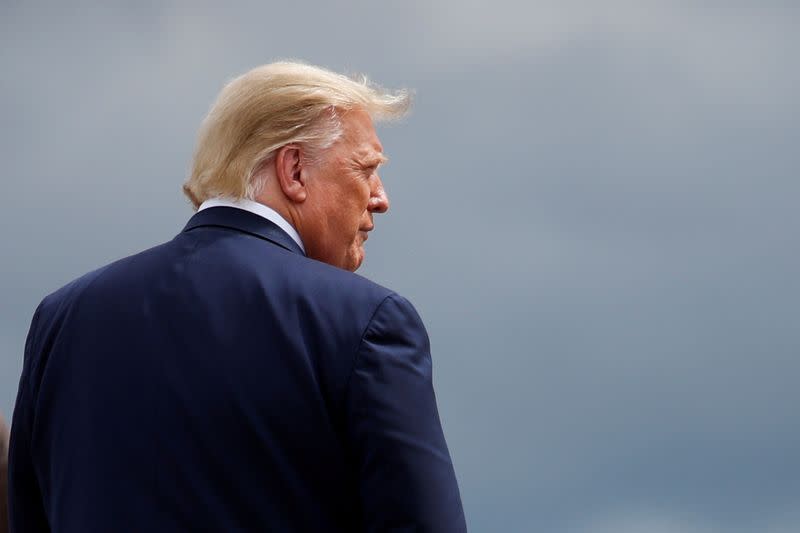 FILE PHOTO: U.S. President Trump disembarks from Air force One as he arrives on campaign travel in Marrietta, Georgia