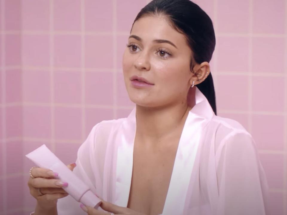 Kylie Jenner showing one of her products.