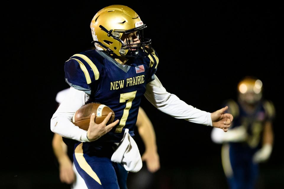 New Prairie's Marshall Kmiecik (7) runs with the ball during the New Prairie vs. Northridge regional championship football game Friday, Nov. 11, 2022 at New Prairie High School in New Carlisle.