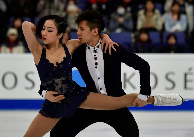 China's Sui Wenjing and Han Cong compete in the pairs short program at the ISU World Figure Skating Championships in Helsinki, Finland on March 29, 2017