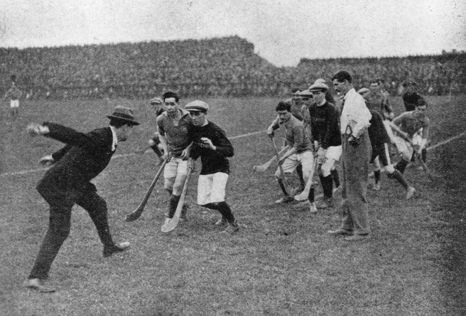 Sinn Fein leader and Commander-In-Chief of the Irish Free State Army Michael Collins starting a hurling match at Croke Park in 1921Getty Images