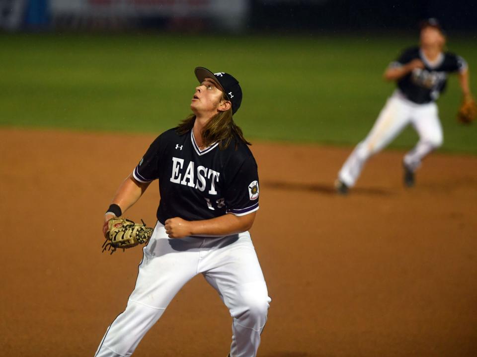 Sioux Falls Post 15 East's Jackson Boe looks up as a ball flies over his head in the American Legion regional tournament on Wednesday, August 4, 2021 at the Birdcage in Sioux Falls.