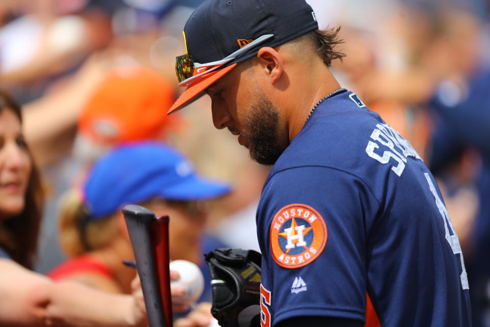 <p>Houston Astros player George Springer signs for fans before the baseball game against the New York Mets at the Ballpark of the Palm Beaches in West Palm Beach, Fla. on Feb. 26, 2018. (Photo: Gordon Donovan/Yahoo News) </p>