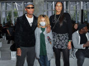 <p>Pharrell Williams, son Rocket and wife Helen attend the Chanel Métiers d'Art 2021/22 show at Le 19M on Dec. 7 in Paris.</p>