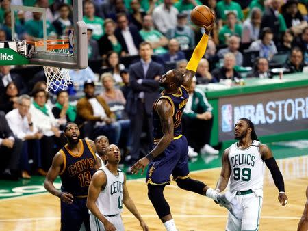 May 25, 2017; Boston, MA, USA; Cleveland Cavaliers forward LeBron James (23) dunks and scores against the Boston Celtics during the third quarter of game five of the Eastern conference finals of the NBA Playoffs at the TD Garden. Mandatory Credit: Greg M. Cooper-USA TODAY Sports