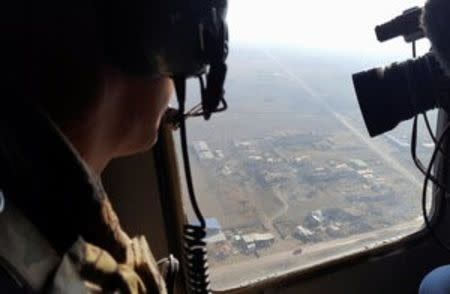 An aerial view of Mosul taken from helicopter is seen during the battle against Islamic State militants in Iraq, January 4, 2017. Picture taken January 4, 2017. REUTERS/Stephen Kalin