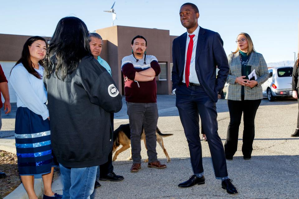 Wally Adeyemo, right, the U.S. deputy secretary of the treasury, visits with members of the Torres Martinez Desert Cahuilla Indians on Thursday in Thermal.