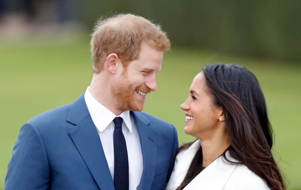 Prince Harry popped the question to the American actress at the beginning of November in their Kensington Palace cottage, presenting her with a stunning three-stone diamond ring. Photo: Getty Images