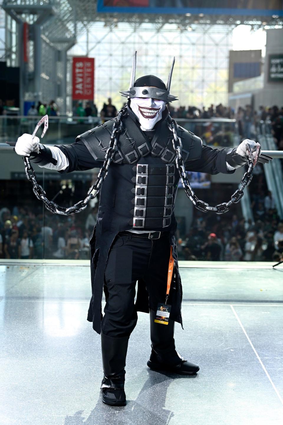 A cosplayer dressed as The Batman Who Laughs at New York Comic Con 2022.