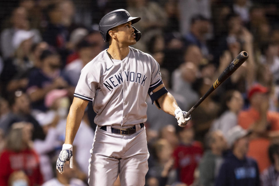 BOSTON, MA - SEPTEMBER 26: Giancarlo Stanton #27 of the New York Yankees reacts after hitting a two run home run during the eighth inning of a game against the Boston Red Sox on September 26, 2021 at Fenway Park in Boston, Massachusetts. (Photo by Billie Weiss/Boston Red Sox/Getty Images)