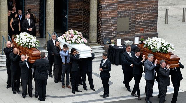 Three caskets were carried into St Mary's Catholic Church in Concord on Wednesday morning. Photo: AAP