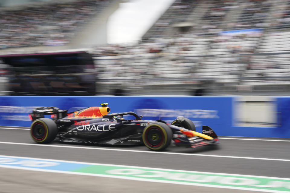 Red Bull driver Sergio Perez of Mexico steers his car during the second practice ahead of the Japanese Formula One Grand Prix at the Suzuka Circuit, Suzuka, central Japan, Friday, Sept. 22, 2023. (AP Photo/Toru Hanai)