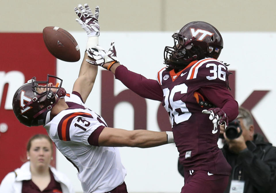 Adonis Alexander, knocking the ball away from receiver Caleb Farley during the Hokies' spring game in 2017, could be a supplemental draft selection on Wednesday. (AP) 