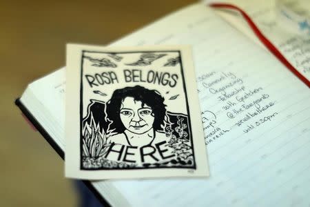 A leaflet is seen during a strategy meeting for immigrant Rosa Sabido who lives in sanctuary in the United Methodist Church while facing deportation in Mancos, Colorado, U.S., July 18, 2017. REUTERS/Lucy Nicholson/Files
