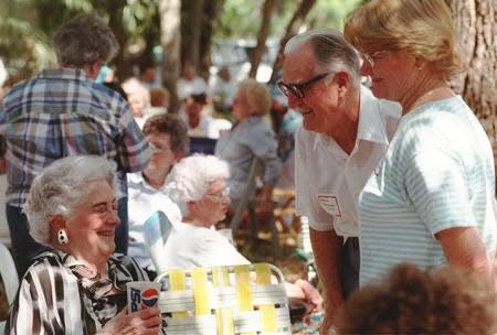 Fort Myers pioneer Virginia Sheppard Holloway, the first Edison Festival of Lights queen in 1938, shares a laugh with pioneers Erwyn Sparks and his daughter, Ginger Barnard in this photo from the 1996 Pioneer Picnic.