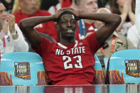 North Carolina State forward Mohamed Diarra (23) sits on the bench during the second half of the NCAA college basketball game against Purdue at the Final Four, Saturday, April 6, 2024, in Glendale, Ariz. (AP Photo/David J. Phillip)