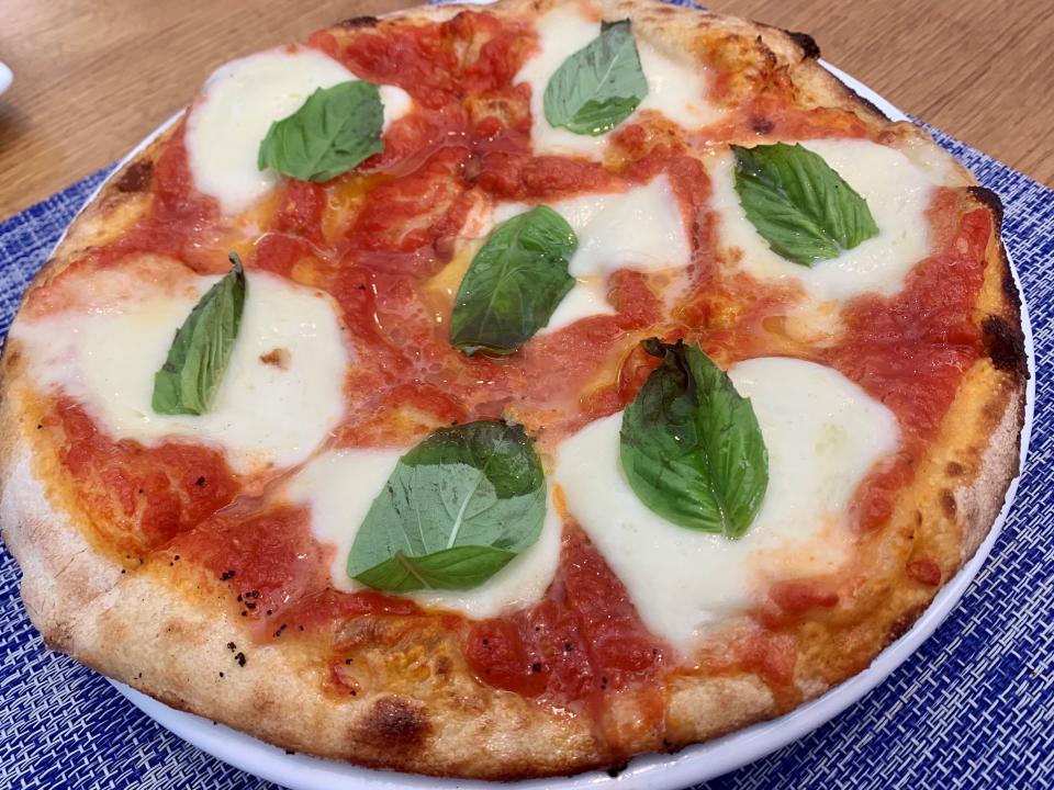 The Margherita pizza at Station 49 in Palm Bay had sauce, slices of fresh mozzarella and basil leaves.