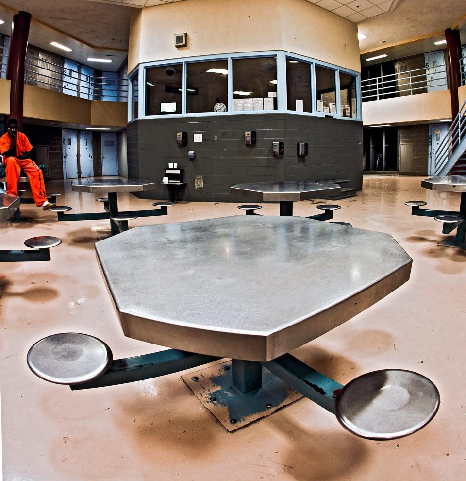 A table in a cell block is pictured at the Oklahoma County jail.