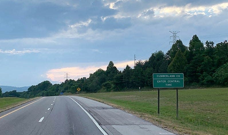 A road sign on Interstate 40 marks the time zone change in Cumberland County.