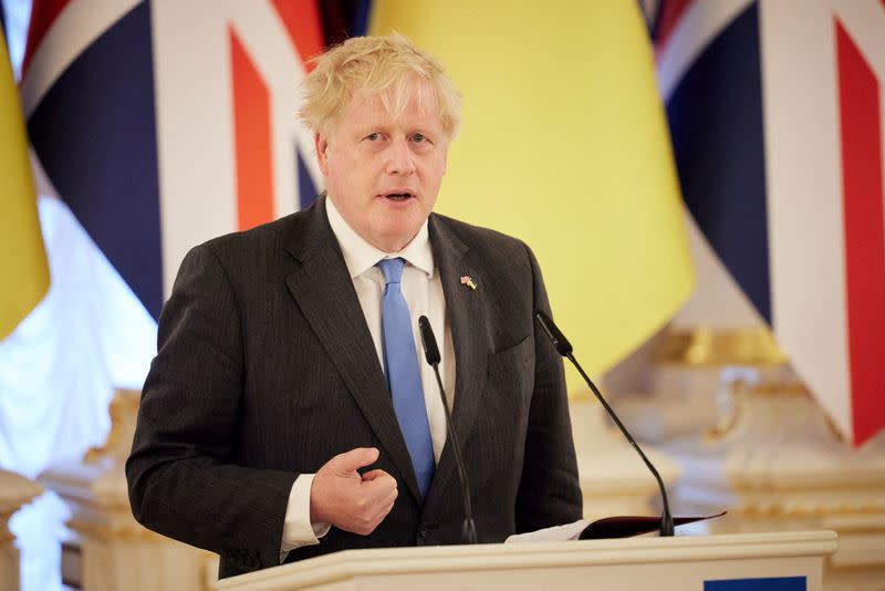 FILE PHOTO: British PM Johnson and Ukraine's President Zelenskiy attend a news briefing in Kyiv