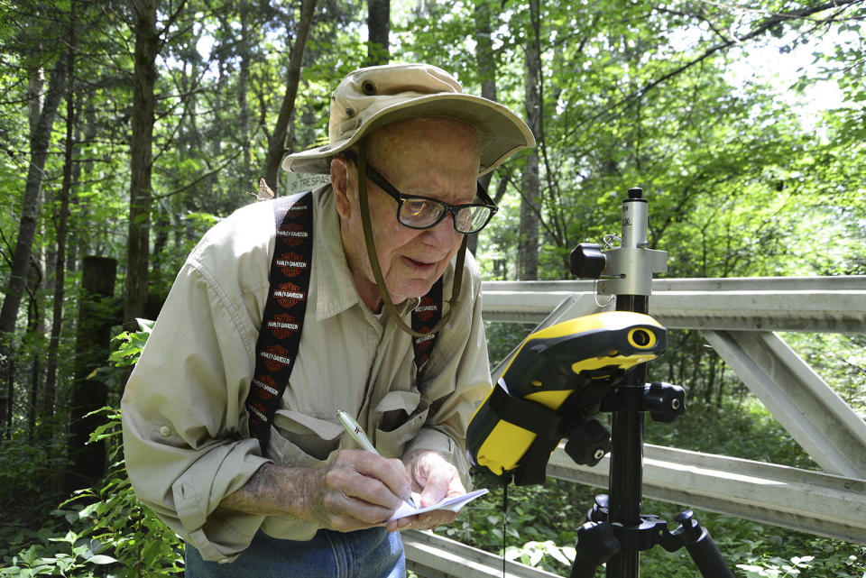 This Aug. 2, 2016 photo provided by Indiana Department of Natural Resources shows Bob Vollmer. Vollmer, 102, who is Indiana's oldest state employee is retiring after nearly six decades on the job, saying that “your body tells you when it's time to go.” Vollmer plans to report to work for the last time Feb. 6, 2020, as a surveyor for the Indiana Department of Natural Resources. The southern Indiana man, whose mother lived to be 108, joined the state agency in 1962. (John Maxwell/ Indiana Department of Natural Resources via AP)