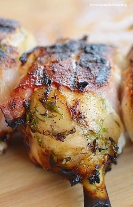 <p>These grilled chicken legs, also known as <em>Churrasco de Frango</em> in Brazil, are marinated in beer and herbs, wrapped in bacon, then grilled to perfection. They make one of the best BBQs you could ever have! <strong>Get the Recipe: <a href="https://www.easyanddelish.com/4th-of-july-grilled-chicken-legs-wrapped-in-bacon-churrasco-de-frango-com-bacon/" rel="nofollow noopener" target="_blank" data-ylk="slk:Grilled Chicken Legs;elm:context_link;itc:0;sec:content-canvas" class="link rapid-noclick-resp">Grilled Chicken Legs</a></strong></p><p><strong>Related: <a href="https://parade.com/1025306/kristamarshall/easy-crock-pot-bbq-rib-recipes/" rel="nofollow noopener" target="_blank" data-ylk="slk:20 Fall-off-the-Bone Crock-Pot Rib Recipes;elm:context_link;itc:0;sec:content-canvas" class="link rapid-noclick-resp">20 Fall-off-the-Bone Crock-Pot Rib Recipes</a></strong></p>