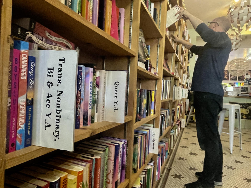 An LGBTQ+ related book is seen on shelf at Fabulosa Books a store in the Castro District of San Francisco on Thursday, June 27, 2024. "Books Not Bans" is a program initiated and sponsored by the store that sends boxes of LGBTQ+ books to LGBTQ+ organizations in conservative parts of America, places where politicians are demonizing and banning books with LGBTQ+ affirming content. (AP Photo/Haven Daley)