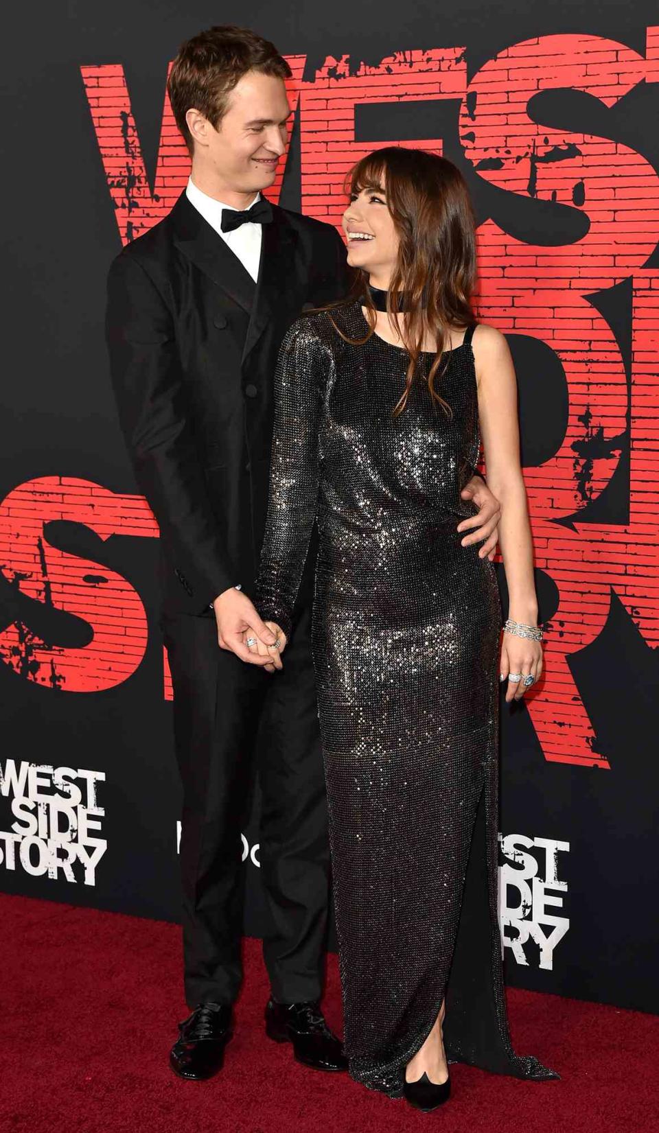 Ansel Elgort and Violetta Komyshan attend Disney Studios' Los Angeles Premiere of "West Side Story" at El Capitan Theatre on December 07, 2021 in Los Angeles, California