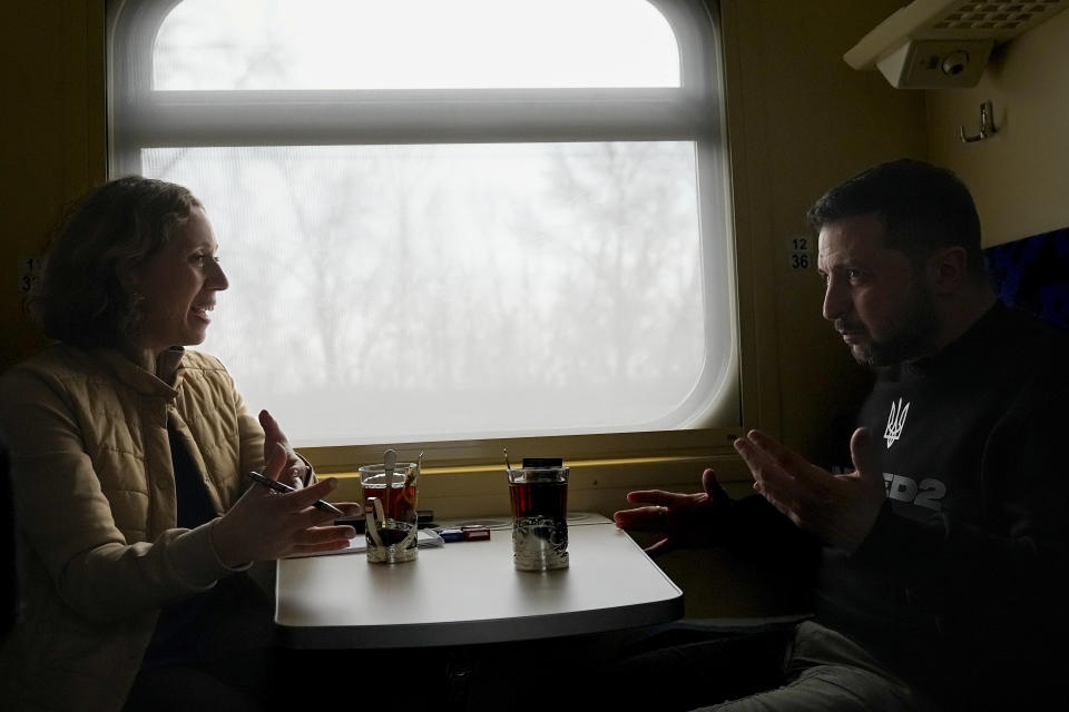 Ukrainian President Volodymyr Zelenskyy speaks during an interview with Julie Pace, senior vice president and executive editor of The Associated Press, on a train traveling from the Sumy region to Kyiv, Ukraine, Tuesday March 28, 2023. (AP Photo/Efrem Lukatsky)