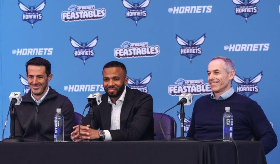 Charlotte Hornets Co-Chairmen Gabe Plotkin, left, and Rick Schnall, right, announce Jeff Peterson, center, as its Executive Vice President of Basketball Operations during a press conference at Spectrum Center on Wednesday, March 6, 2024. Peterson becomes the organization’s chief basketball decision maker while also being responsible for leading the team’s day-to-day basketball operations.