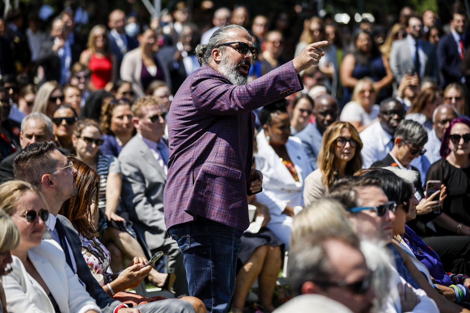 Manuel Oliver, whose son Joaquin was killed in the Parkland mass shooting, interrupts President Joe Biden as he speaks about Safer Communities Act on the South Lawn of the White House on July 11, 2022. (Chip Somodevilla / Getty Images)