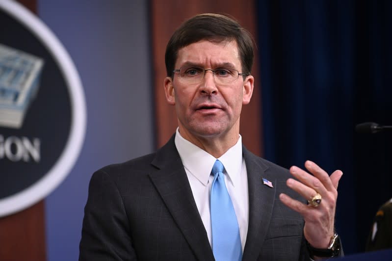 U.S. Defense Secretary Esper addresses reporters at the Pentagon in Arlington