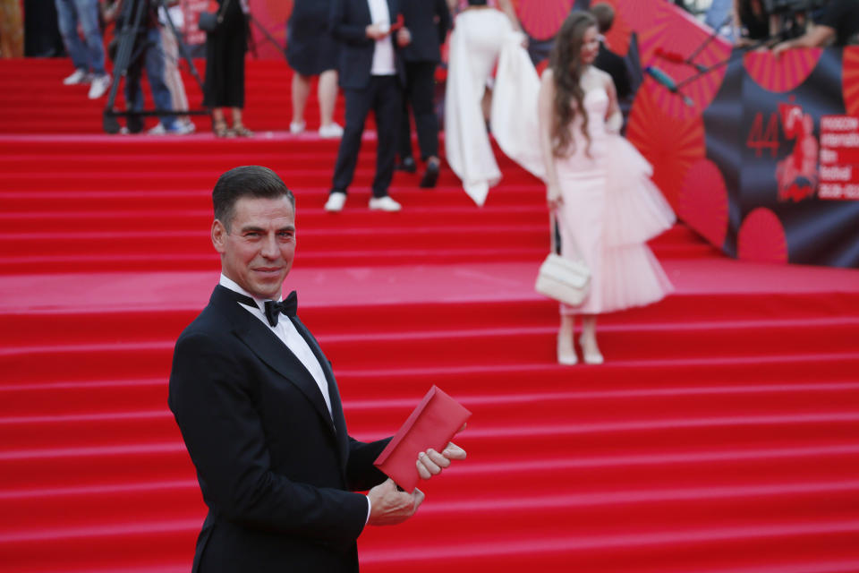 Russian actor Dmitri Dyuzhev poses during the opening ceremony of the 44th Moscow International Film Festival in Moscow, Russia, Friday, Aug. 26, 2022. (AP Photo)