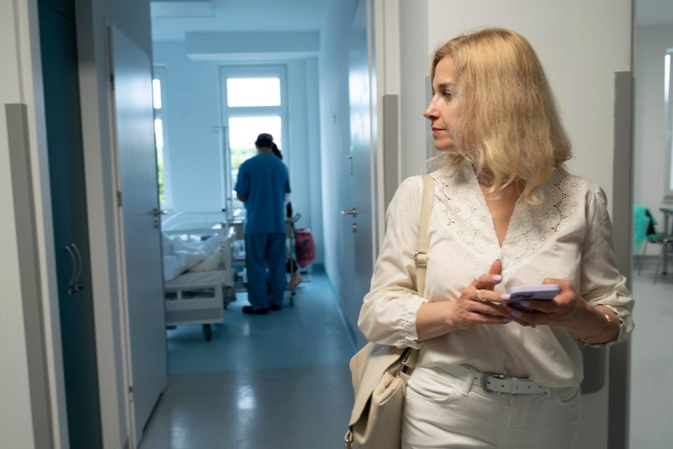 Dr. Nataliya Yevchenko, a psychiatrist who traveled with families from Ukraine goes between hospital rooms of Ukrainian children as they wait for surgery or are recovering at the Independent Public Heath Care Facility in Leczna, Poland on day five of a medical missionary Doctors Collaborating to Help Children on Thursday, May 18, 2023.