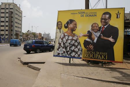 A poster campaigning for presidential candidate, Pascal Irenee Koupaki, is seen erected in the Akpakpa district in Cotonou, Benin March 4, 2016. REUTERS/Akintunde Akinleye