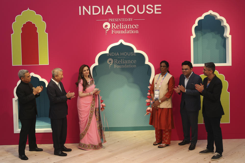 India's Nita Ambani, third left, applauds as she inaugurates the Indian House at the 2024 Summer Olympics, Saturday, July 27, 2024, in Paris, France. (AP Photo/Aurelien Morissard)