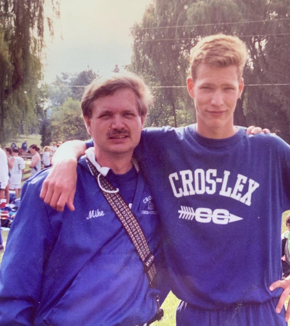 Former Croswell-Lexington cross country runner Eric Jackson (right) is seen with his dad and then-Pioneers coach, Mike, in an undated photo.