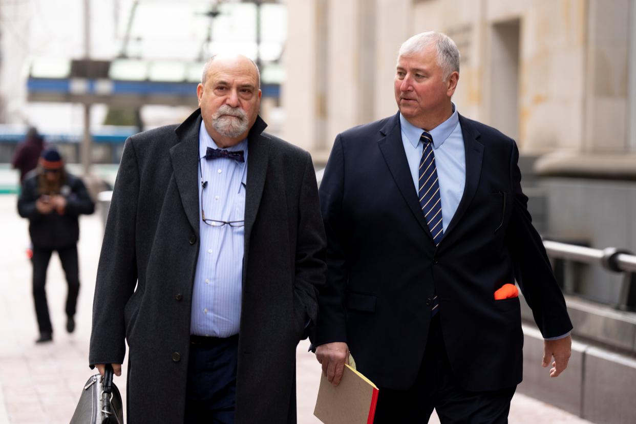 Former Ohio House Speaker Larry Householder leaves the Federal Courthouse with Mark Marein, Householder’s attorney, after a day at the courthouse during his trial for racketeering conspiracy on Thursday, Feb. 2, 2023, in Cincinnati. Larry Householder and former Ohio Republican Party chair Matt Borges are charged with racketeering in an alleged $60 million scheme to pass state legislation to secure a $1 billion bailout for two nuclear power plants owned by FirstEnergy. 