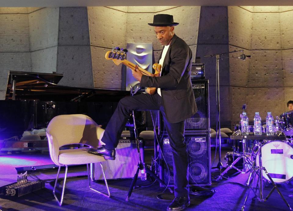U.S jazz musician Marcus Miller performs during the international Jazz Day at the UNESCO headquarters in Paris, Friday April. 27, 2012. during . (AP Photo/Jacques Brinon)