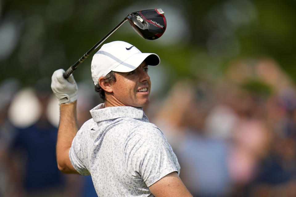 Rory McIlroy, of Northern Ireland, watches his tee shot on the 14th hole during the final round of the PGA Championship golf tournament at Oak Hill Country Club on Sunday, May 21, 2023, in Pittsford, N.Y. (AP Photo/Abbie Parr)